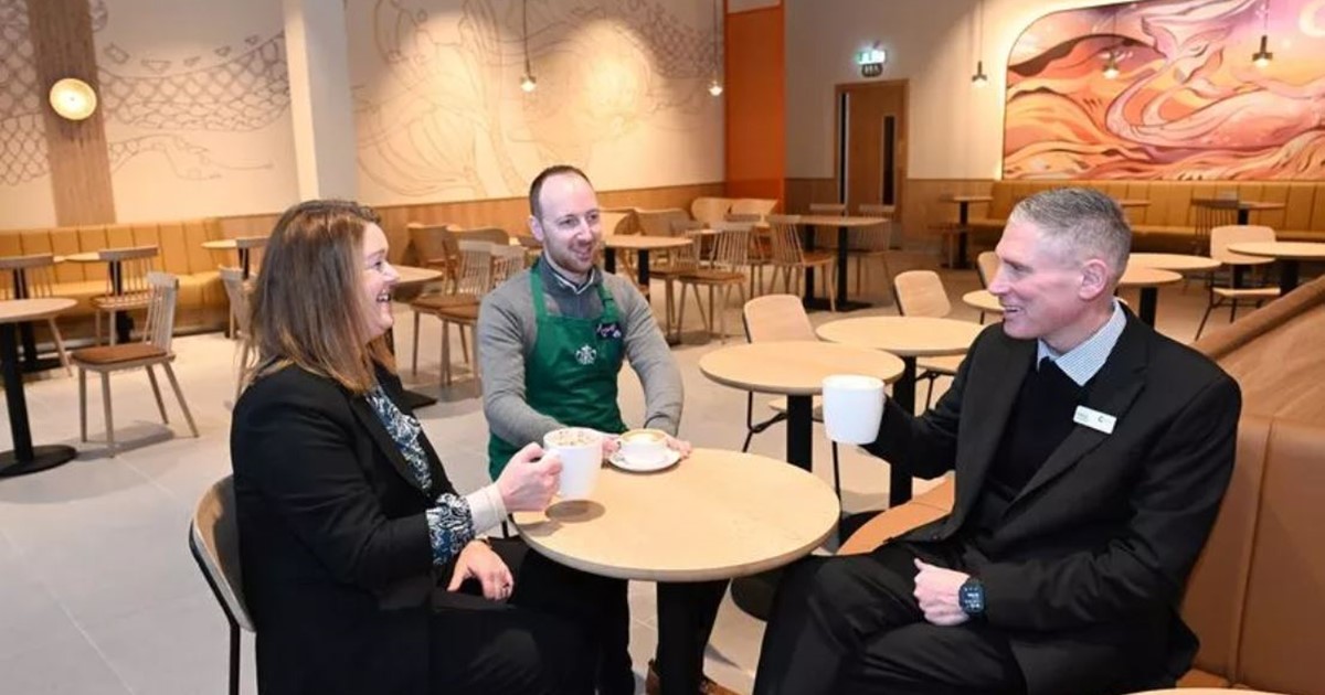 Centre director Patrick Robbertze with Starbucks Employees